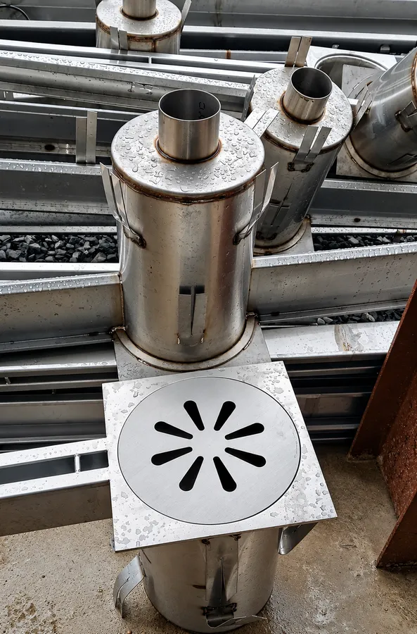 Stainless steel drain traps installed in a floor