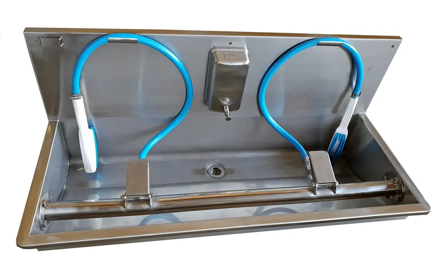 Two person stainless steel boot washer with two water-fed brushes and soap dispenser