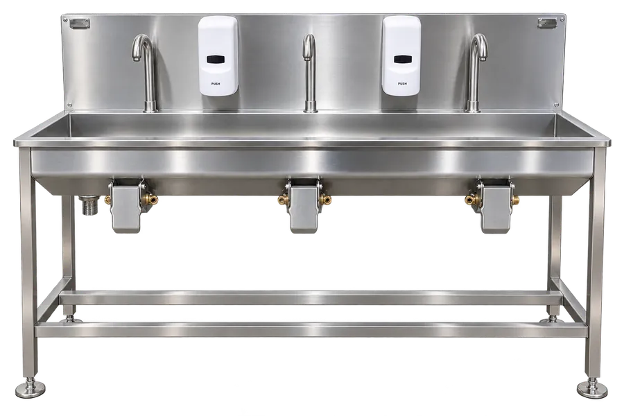 Three person stainless steel hand wash basin with three knee operated valves and soap dispensers