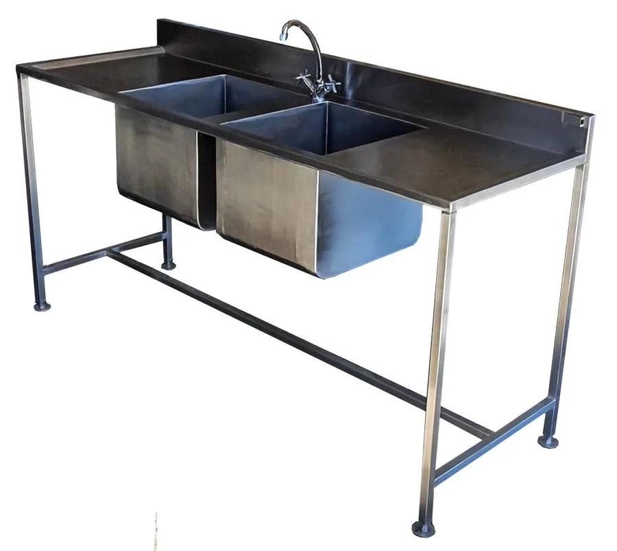 Double stainless steel equipment basin with workspace on both sides and mixer tap