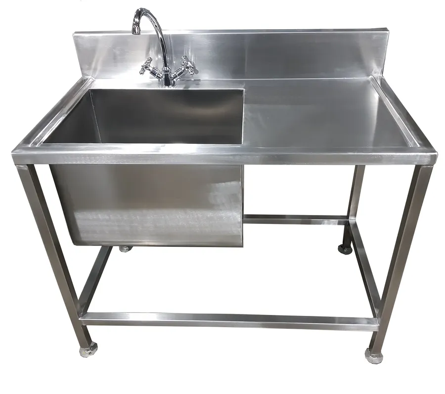 Single stainless steel equipment basin with workspace, splashback and mixer tap