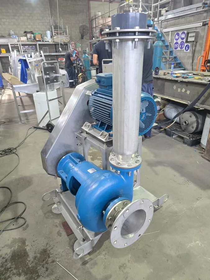 Feather and soft offal pump with blue motor and stainless steel pipework